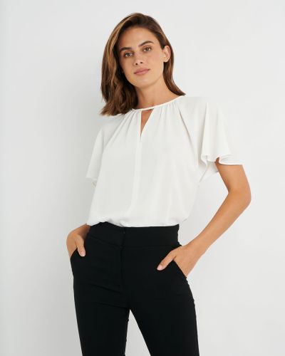 Forcast Fashion, the Elin Flutter Sleeve Blouse features soft flutter sleeves that falls delicately over the shoulders and gathered neckline detail