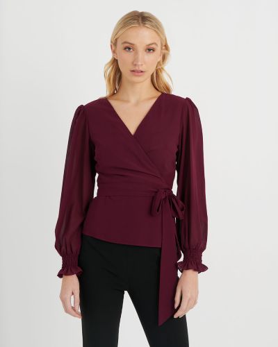 Forcast Clothing, the Kimora Wrap Blouse features v-neckline , wrap style with tie waist and long sleeves