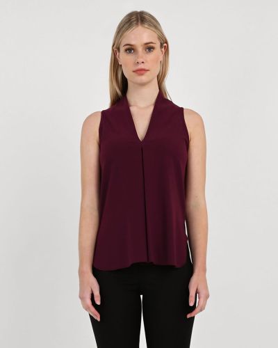 Forcast Clothing, the Tara V-Neck Tunic Top features v-neckline and side split with curved hem edges