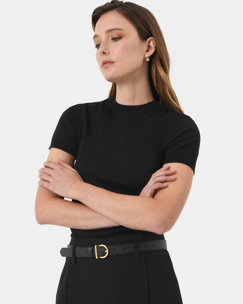 Forcast Clothing, the Catherine Short Sleeve Knit, features short sleeves and back neck button detail in a flattering fit