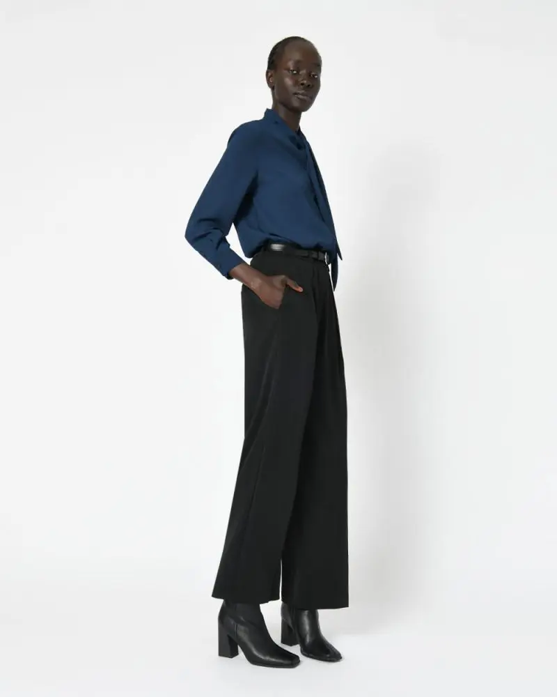 Forcast Clothing, the Rayleen High-Waisted Pants, featuring a simple design and wide legged silhouette