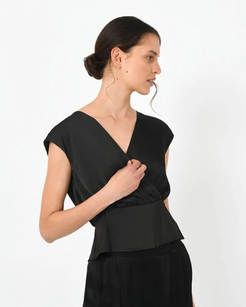 Forcast Clothing, the Venus Peplum Blouse, featuring cross over front and silky satin shine