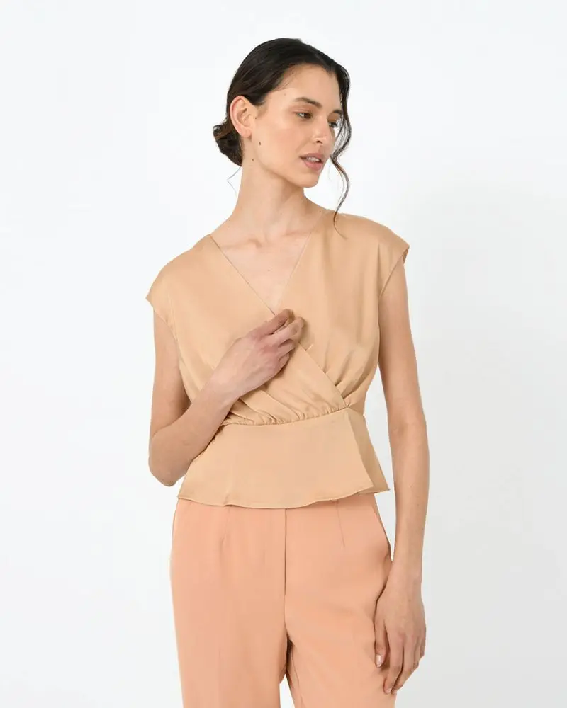 Forcast Clothing, the Venus Peplum Blouse, featuring cross over front and silky satin shine