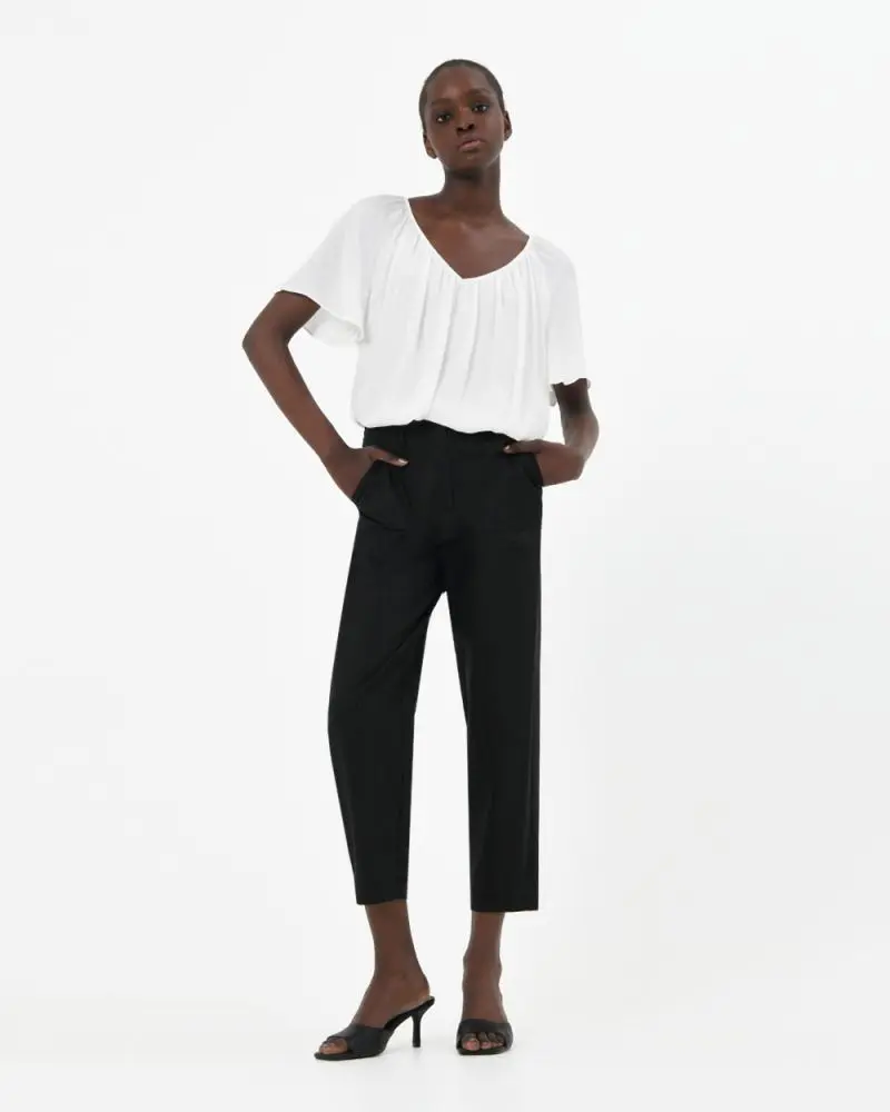 Forcast clothing, the Nico Gathered Neck Top, features floaty sleeves and a V-neckline