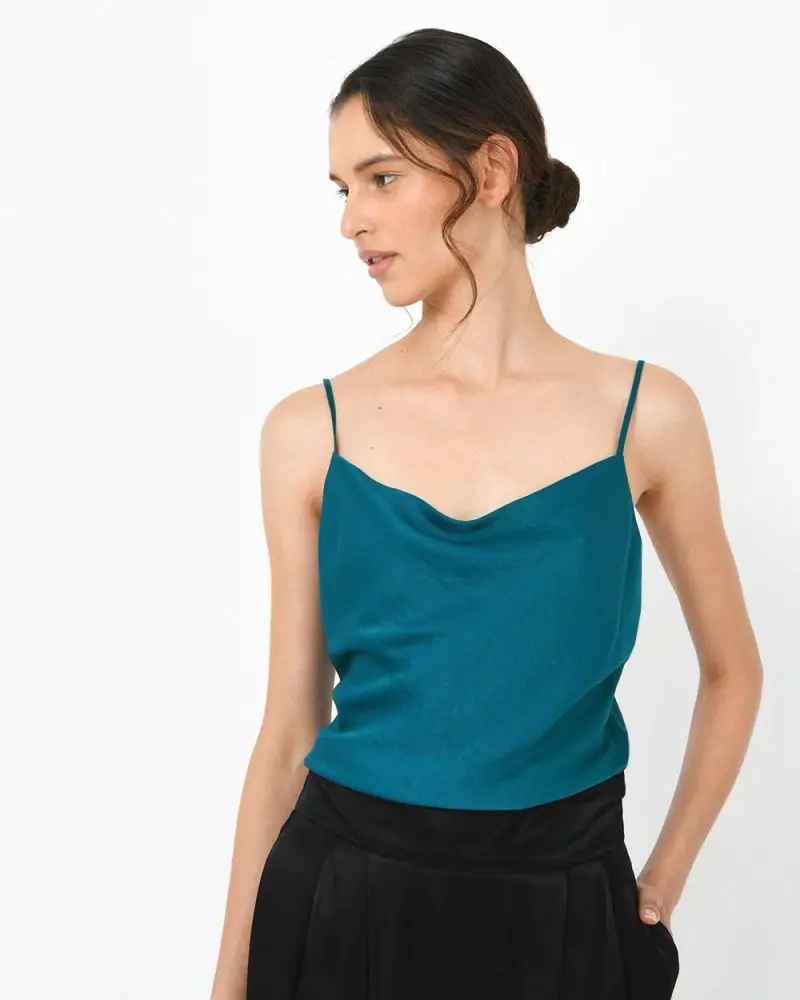 Forcast Clothing, the Isabel Cowl Neck Blouse, features a cowl neckline and spaghetti straps.