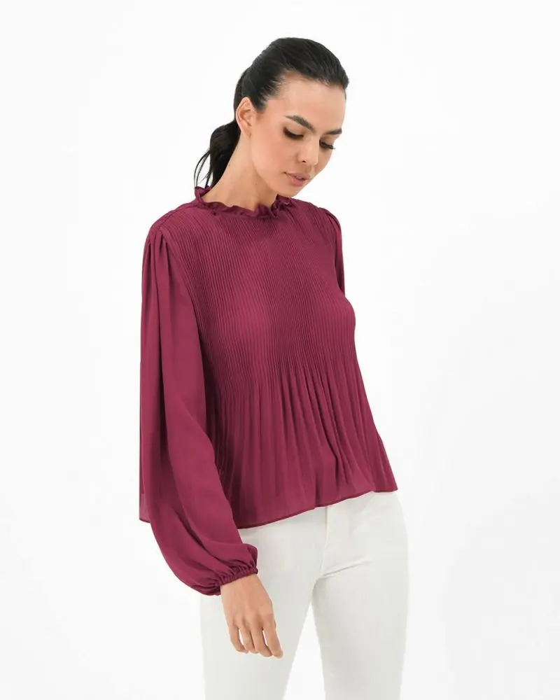 Forcast Clothing, the Ariella Pleated Long Sleeve Blouse, features gathered neckline and relaxed fit