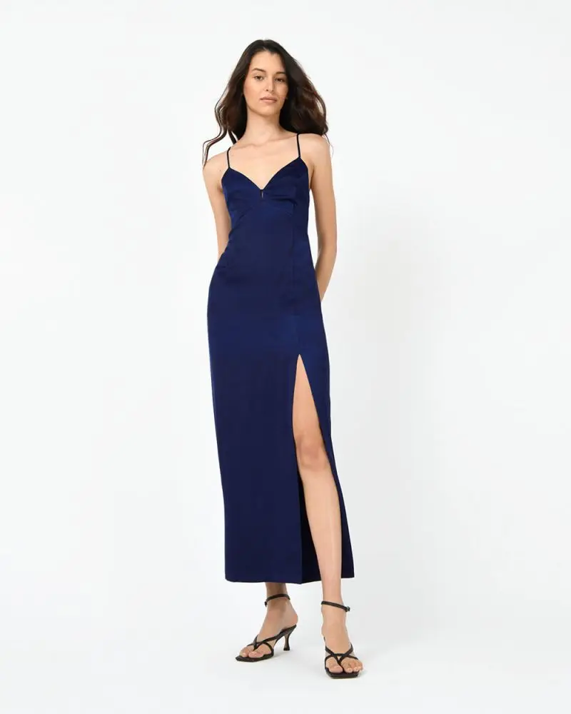 Forcast Clothing, the Muse Backless Maxi Dress, features a leg split and backless design