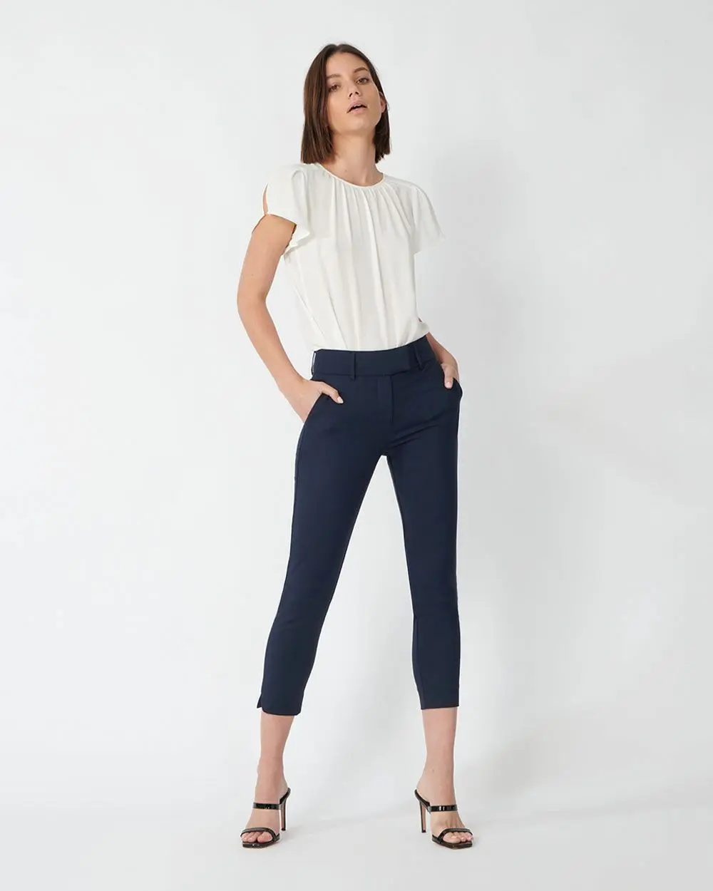Forcast Clothing, the Josie Cropped Notch Pants, featuring cropped hem with side splits and a comfortable waist band that sits mid to high rise style
