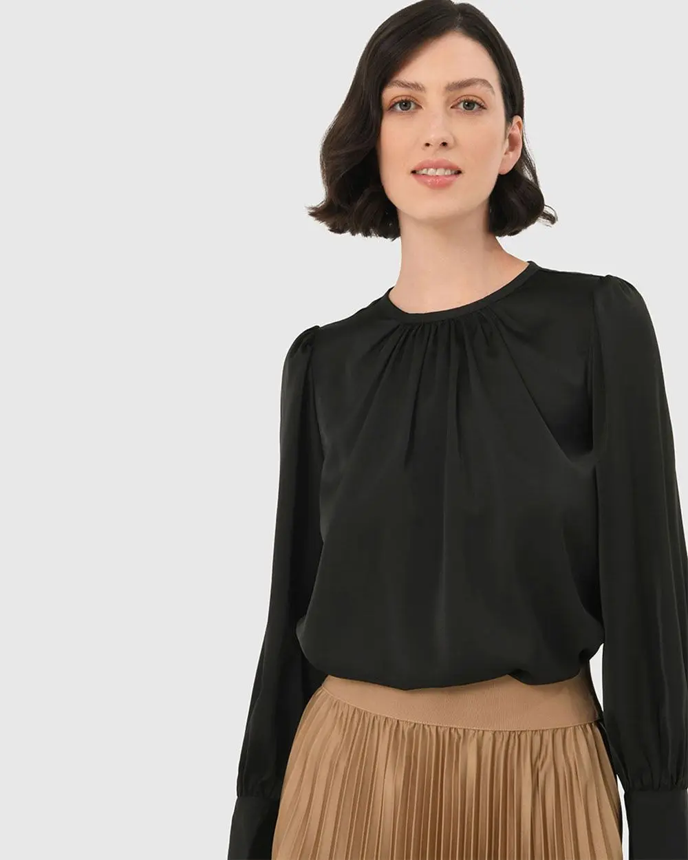 Forcast Clothing, the Cameron Satin Blouse features gathered details and silky satin fabrication