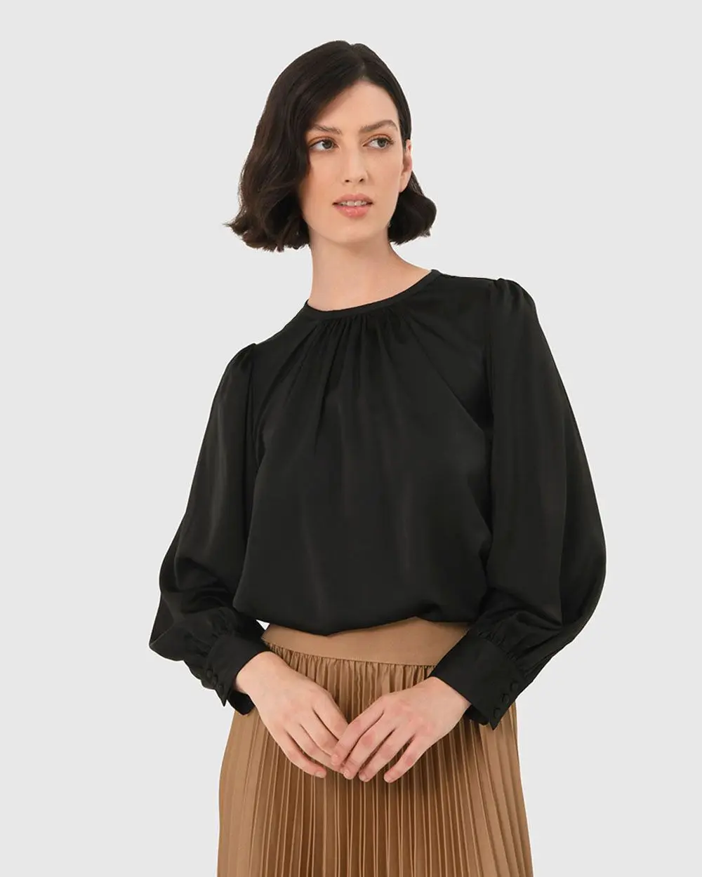 Forcast Clothing, the Cameron Satin Blouse features gathered details and silky satin fabrication